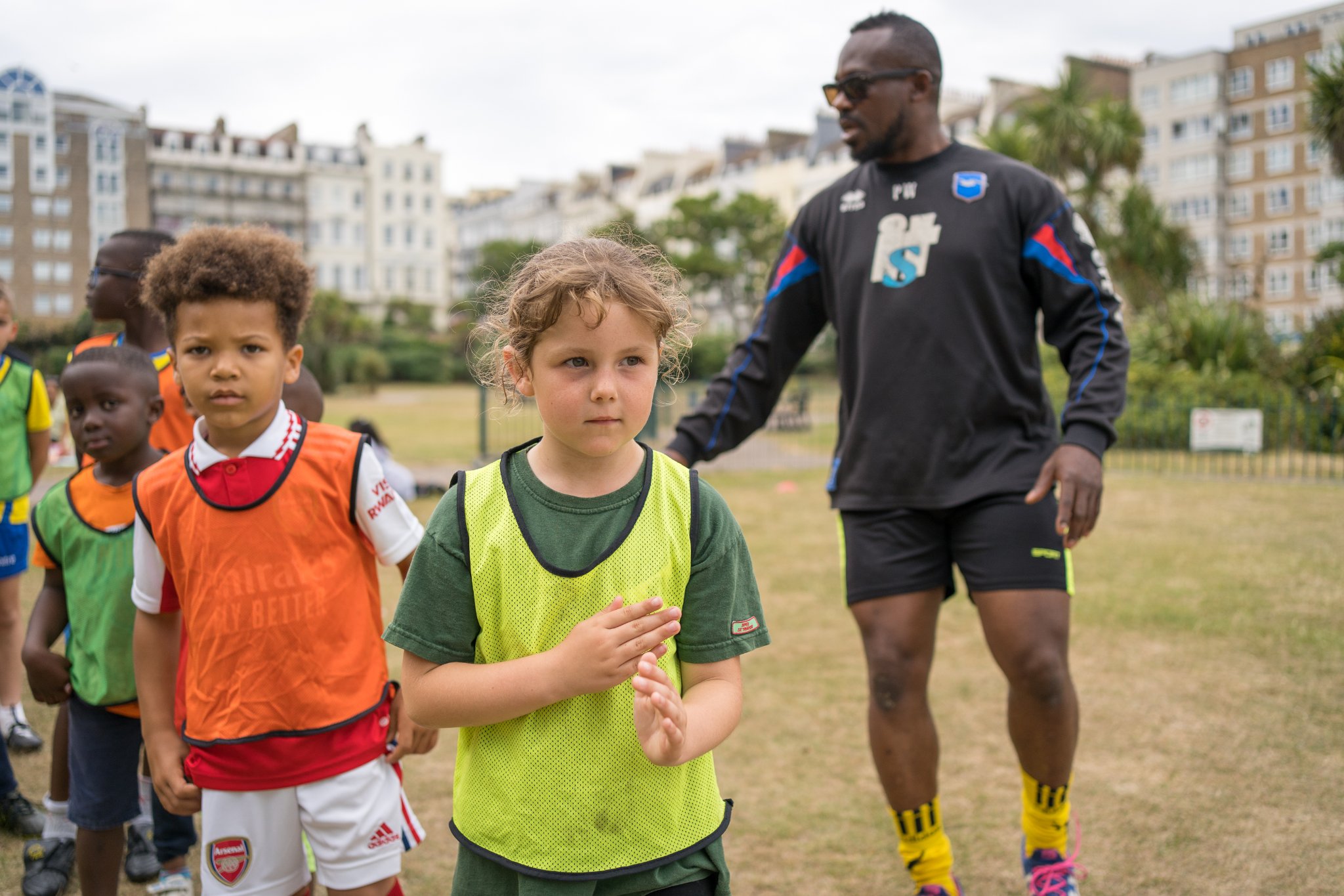 Children playing football at Sparks
